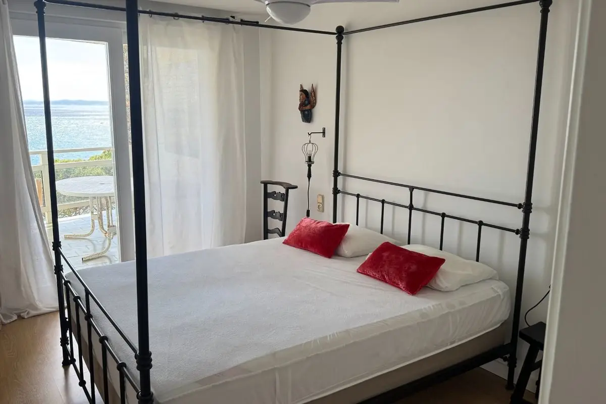 Schlafzimmer 1 · Himmelbett · Meerblick